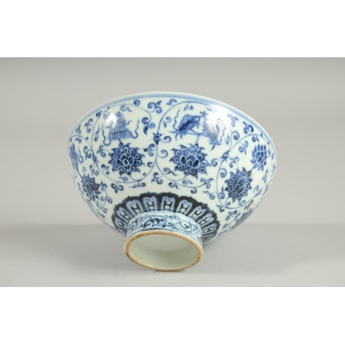 62 - A CHINESE BLUE AND WHITE PORCELAIN FOOTED BOWL, painted with auspicious symbols, 15.5cm diameter.