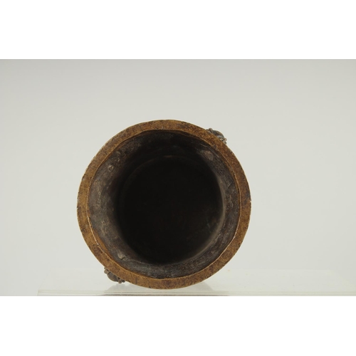 66 - A CHINESE BRONZE TWIN HANDLE CENSER, 8.5cm high.