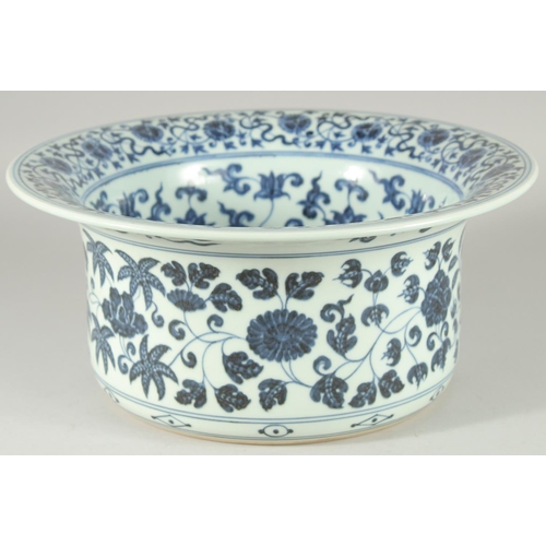 67 - A CHINESE BLUE AND WHITE PORCELAIN WATER BASIN, the interior painted with auspicious symbols and flo... 