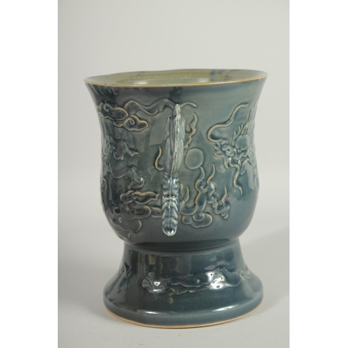 68 - AN IMPRESSIVE CHINESE TWIN HANDLE GOBLET VASE, the body carved with dragon, the handles formed as aq... 