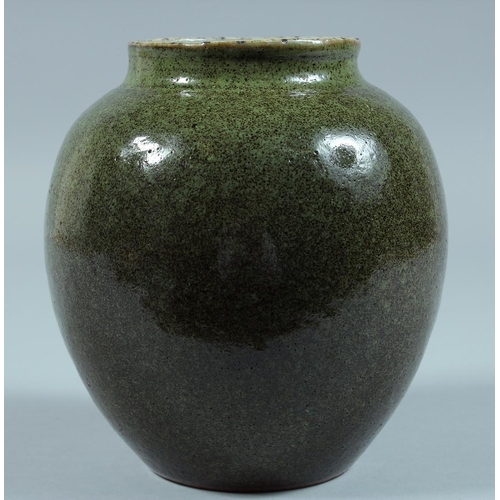 70 - A CHINESE GREEN GLAZED JAR.