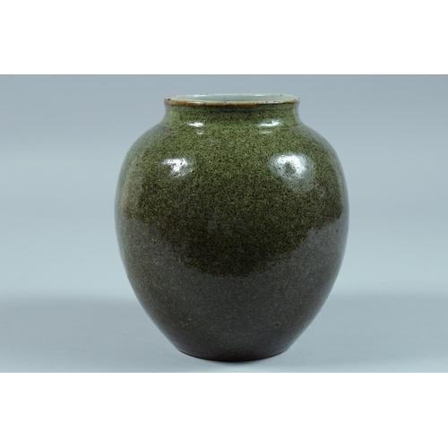 70 - A CHINESE GREEN GLAZED JAR.