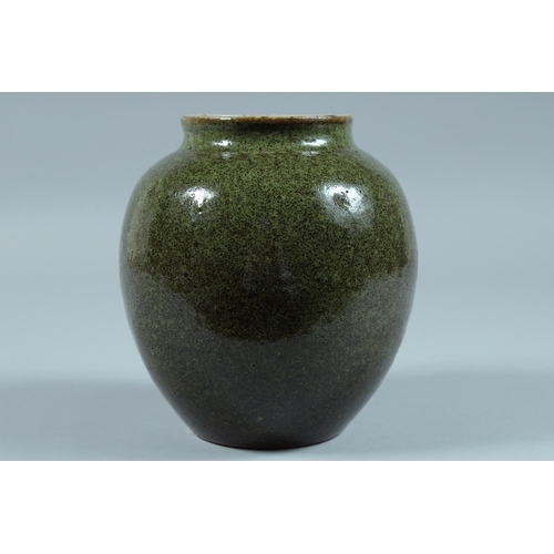 70 - A CHINESE GREEN GLAZED JAR.