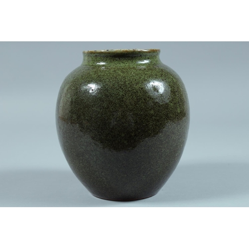 70 - A CHINESE GREEN GLAZED JAR.