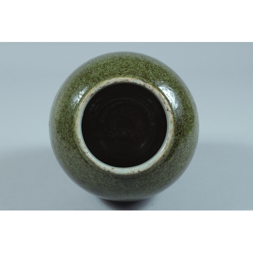 70 - A CHINESE GREEN GLAZED JAR.