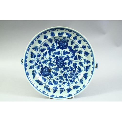 72 - A CHINESE BLUE AND WHITE PORCELAIN WARMING DISH, possibly 18th century, with floral decoration, 28cm... 