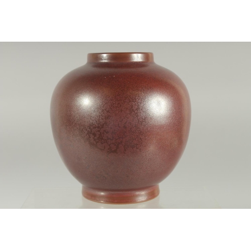 78 - A CHINESE MOTTLED RED GLAZE JAR, character mark to base, 15.5cm high.