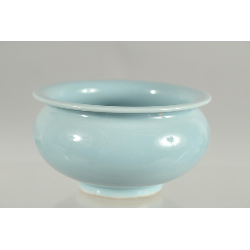 82 - A CHINESE POWDER BLUE PORCELAIN BRUSH WASHER, mark to base, 9.5cm diameter.