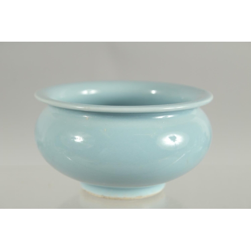 82 - A CHINESE POWDER BLUE PORCELAIN BRUSH WASHER, mark to base, 9.5cm diameter.