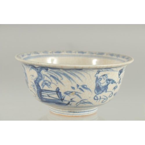 85 - A CHINESE BLUE AND WHITE PORCELAIN BOWL, painted with boys, 14cm diameter.