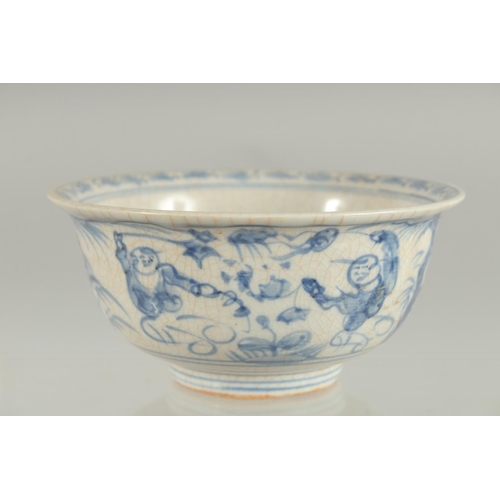 85 - A CHINESE BLUE AND WHITE PORCELAIN BOWL, painted with boys, 14cm diameter.