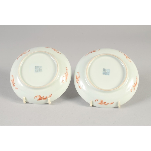 89 - A PAIR OF CHINESE FAMILLE ROSE PORCELAIN BUTTERFLY SAUCERS, six-character mark to base, 13.5cm diame... 