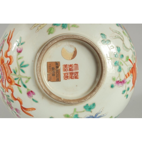 93 - AN EARLY 20TH CENTURT CHINESE FAMILLE ROSE BOWL, painted with flora and precious objects, the interi... 