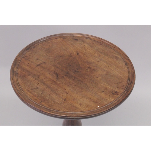 1001 - A GOOD GEORGE III MAHOGANY CIRCULAR TRAY TOP TRIPOD TABLE with tilt top, turned centre column on cur... 