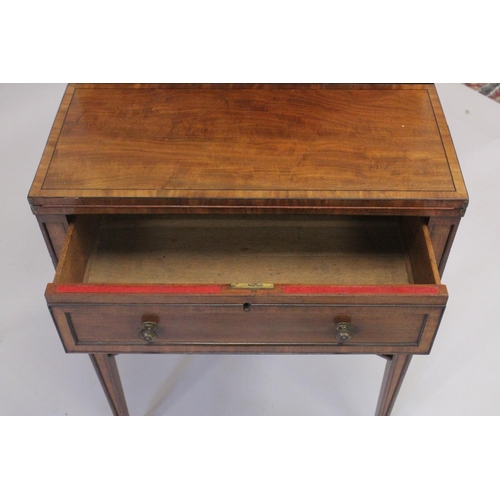 1003 - A GOOD GEORGE III MAHOGANY BONHEUR DU JOUR the top fitted with four small drawers either side of ope... 