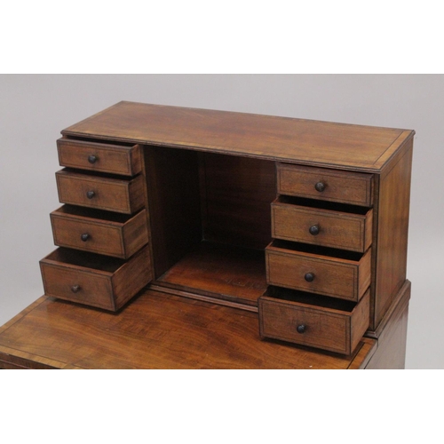 1003 - A GOOD GEORGE III MAHOGANY BONHEUR DU JOUR the top fitted with four small drawers either side of ope... 