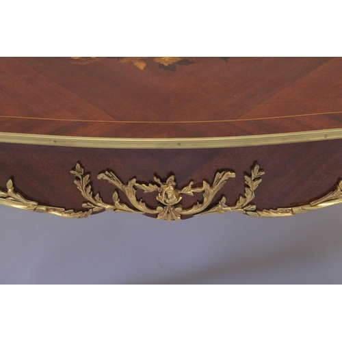 1009 - A LOUIS XVITH STYLE MAHOGANY INLAID COFFEE TABLE with floral crossbanded  legs on curving legs. 4ft ... 