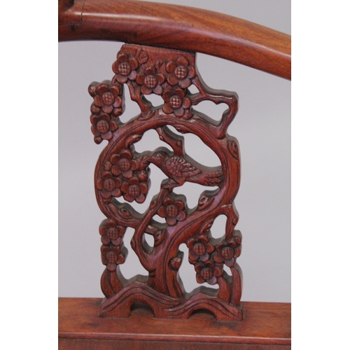 1021 - A CHINESE HARDWOOD ARMCHAIR with carved painted splats