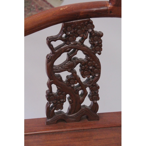 1021 - A CHINESE HARDWOOD ARMCHAIR with carved painted splats