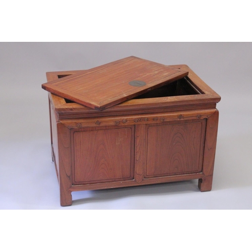 1023 - A CHINESE HARDWOOD CHEST with lift up top. 2ft 10ins long, 1ft 10ins deep, 1ft 10ins high.