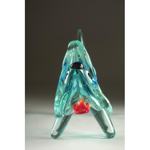 1101 - AN ITALIAN GLASS DOG with blue collar,  ruby tongue and black eyes. 8ins long.