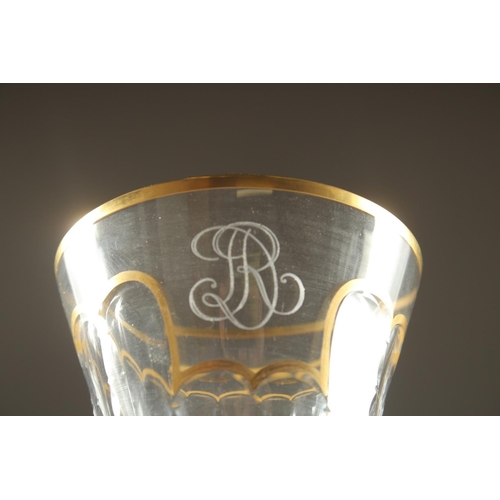 1102 - A GOOD SET OF FIVE BACCARAT CUT GLASS AND GILDED GOBLETS Inlaid J. B. 10ins high.