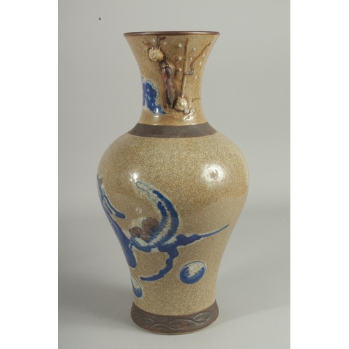 1238 - A CHINESE CRACKLE GLAZE AND BLUE PO0RCELAIN VASE. 16ins high.