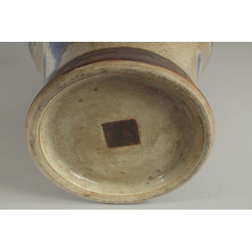 1238 - A CHINESE CRACKLE GLAZE AND BLUE PO0RCELAIN VASE. 16ins high.