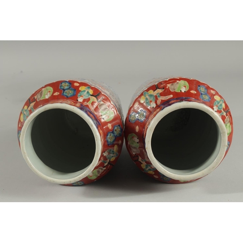 1239 - A PAIR OF IMARI VASES. 9.5ins high.