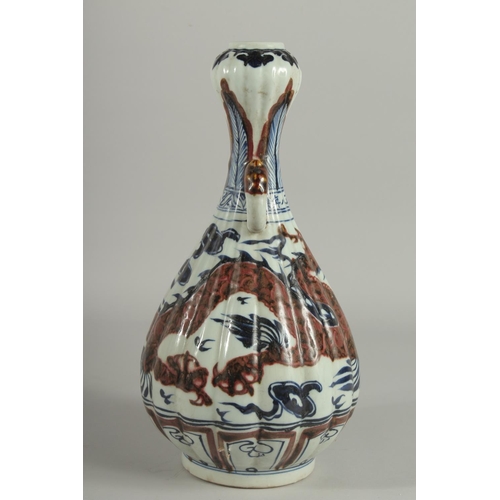 1243 - A CHINESE BLUE AND BRONZE GARLIC HEAD VASE with dragon design.