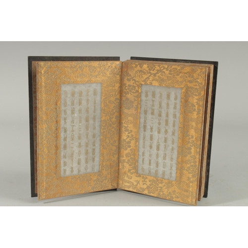 1251 - A BOOK OF EIGHT CHINESE TABLETS.