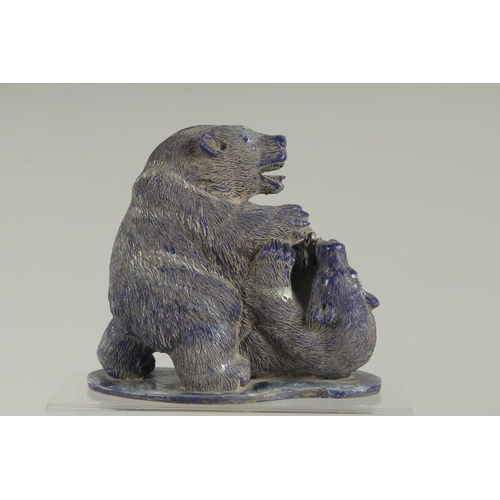 1259 - A GOOD PAIR OF CARVED LAPIS BEARS on a shaped base. 6ins high.