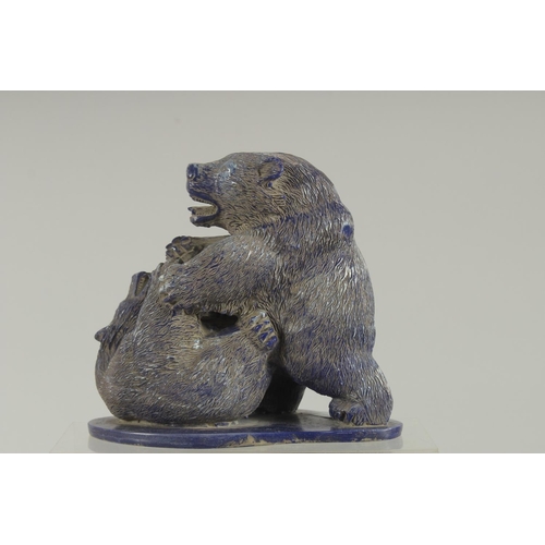 1259 - A GOOD PAIR OF CARVED LAPIS BEARS on a shaped base. 6ins high.