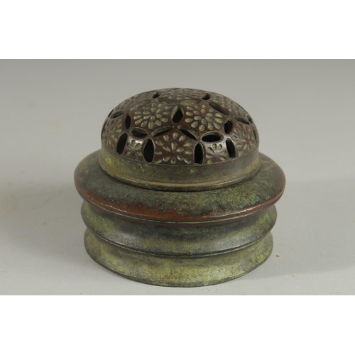 1263 - A CHINESE CIRCULAR BRONZE CENSER AND COVER 5ins diameter.