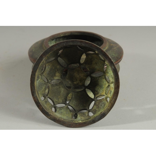 1263 - A CHINESE CIRCULAR BRONZE CENSER AND COVER 5ins diameter.