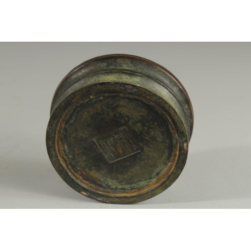 1263 - A CHINESE CIRCULAR BRONZE CENSER AND COVER 5ins diameter.