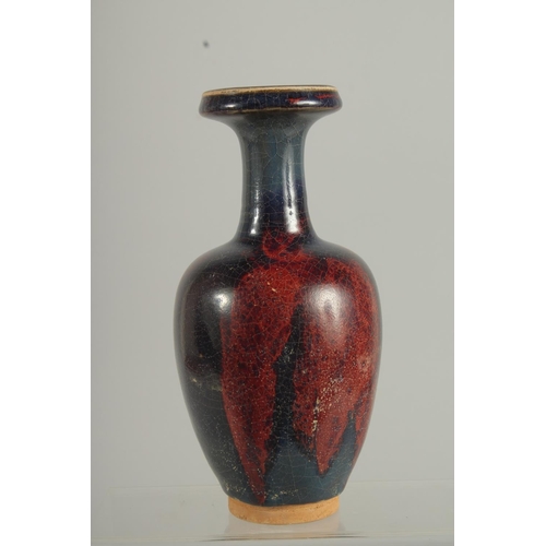 1264 - A CHINESE PURPLE SPLASH VASE 8.5ins high.