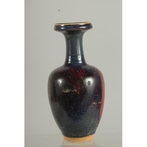 1264 - A CHINESE PURPLE SPLASH VASE 8.5ins high.