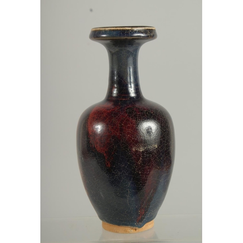 1264 - A CHINESE PURPLE SPLASH VASE 8.5ins high.