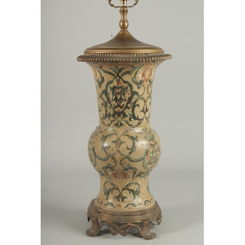 1265 - A GOOD GREEN PORCELAIN LAMP VASE on a bronze stand. Vase: 16ins.