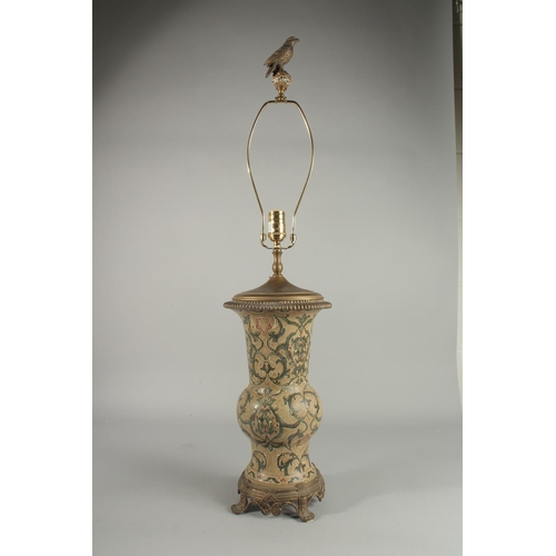 1265 - A GOOD GREEN PORCELAIN LAMP VASE on a bronze stand. Vase: 16ins.