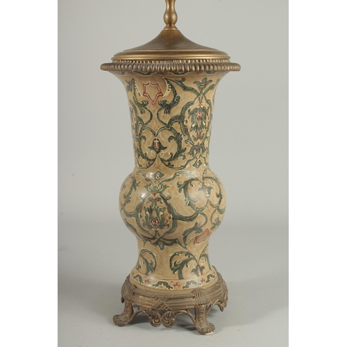 1265 - A GOOD GREEN PORCELAIN LAMP VASE on a bronze stand. Vase: 16ins.