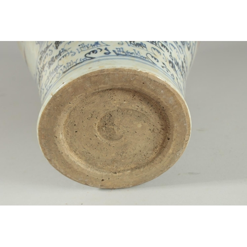 1268 - A LARGE CHINESE BLUE AND WHITE VASE with dragon decoration. 17ins high.