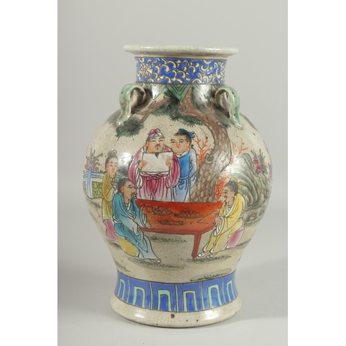 1272 - A CHINESE PORCELAIN VASE painted with flowers with four hands. 12ins high.