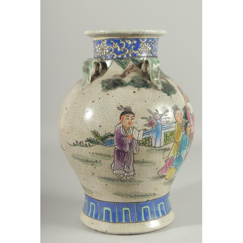 1272 - A CHINESE PORCELAIN VASE painted with flowers with four hands. 12ins high.