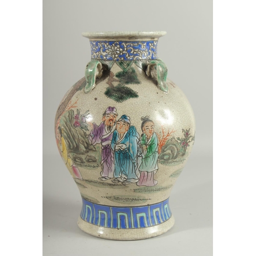 1272 - A CHINESE PORCELAIN VASE painted with flowers with four hands. 12ins high.