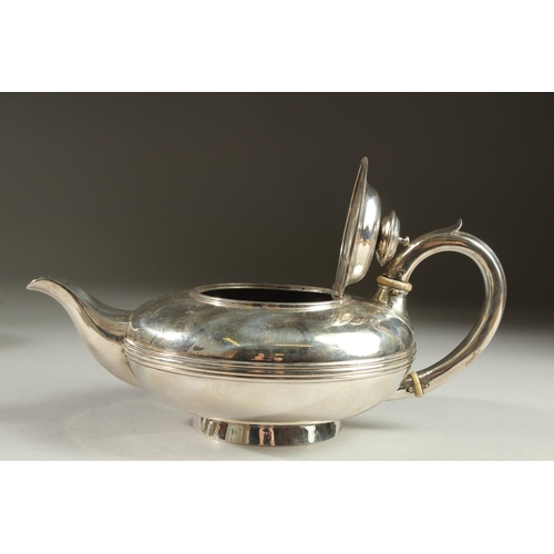 1951 - A GOOD VICTORIAN SILVER CIRCULAR TEAPOT by BENJAMIN SMITH. London 1840.  Weight 17ozs.