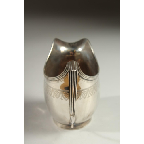 1953 - A GEORGE III SILVER MILK JUG. London 1804.  Maker: I. B.