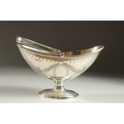 1955 - A VICTORIAN SILVER BOAT SHAPED SUGAR BASIN with bright cut decoration. London 1872.  Maker: Henry Wi... 