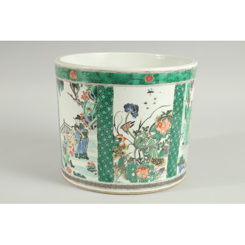 102 - A LARGE CHINESE FAMILLE VERTE PORCELAIN BRUSH POT, painted with panels of figures, flora and fauna, ... 